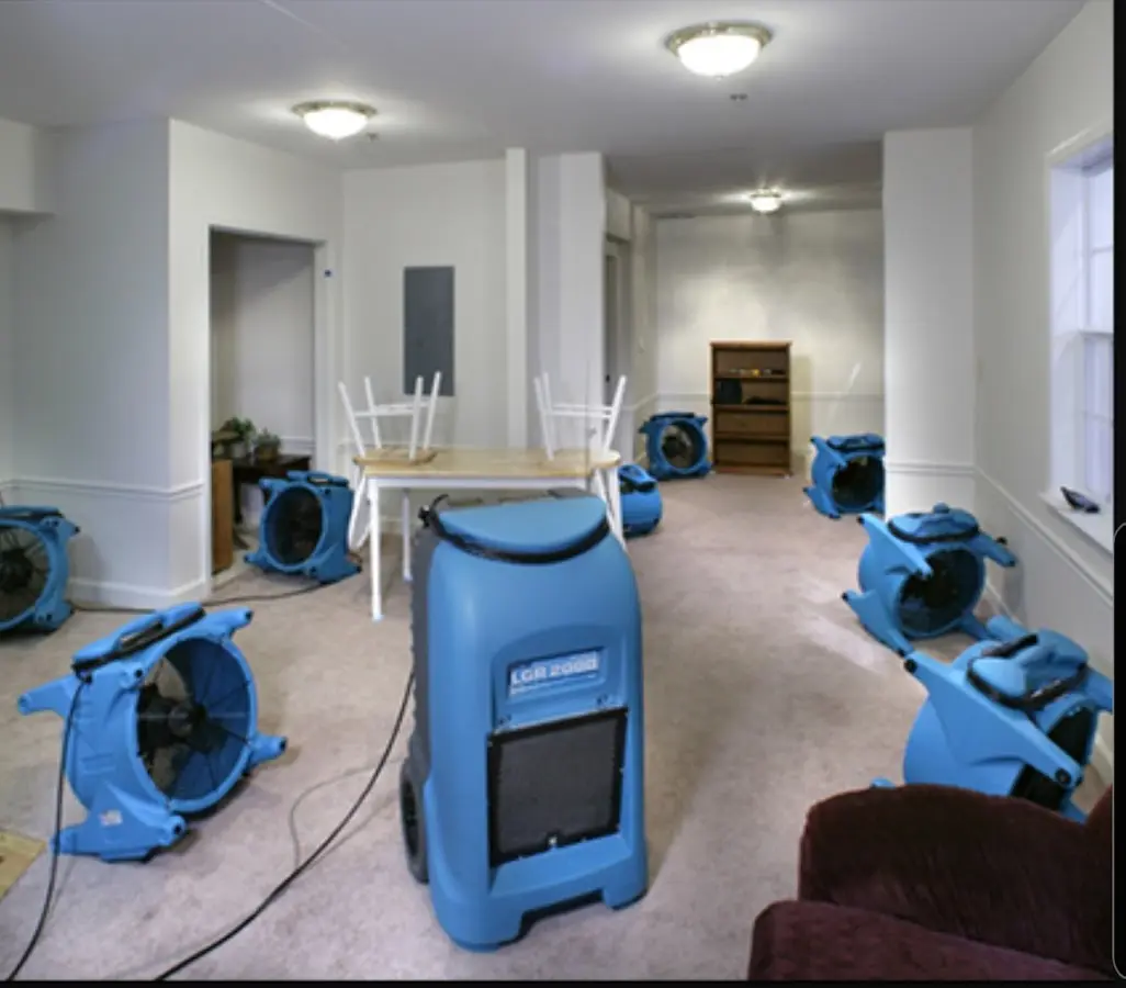 Air movers and dehumidifier setup for Water Damage Restoration in Bartow